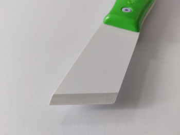 Răzuitor cu cap din plastic rigid